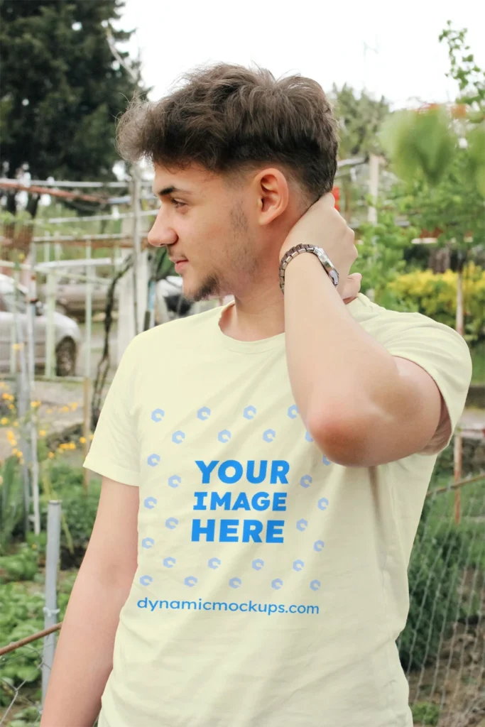 Man Wearing Cream T-shirt Mockup Front View Template