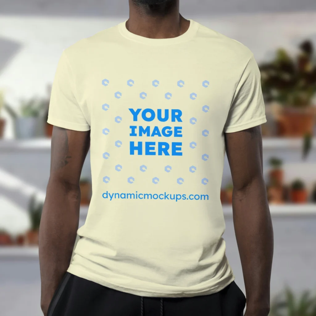 Man Wearing Cream T-shirt Mockup Front View Template