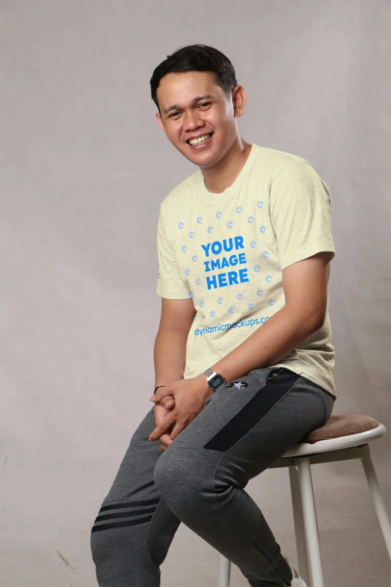 Man Wearing Cream T-shirt Mockup Front View Template