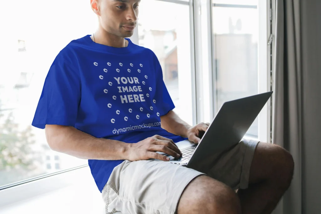 Man Wearing Dark Blue T-shirt Mockup Front View Template