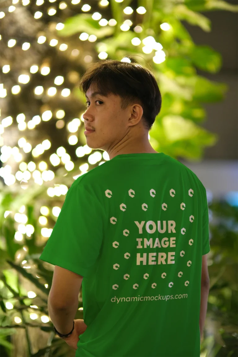 Man Wearing Green T-shirt Mockup Back View Template