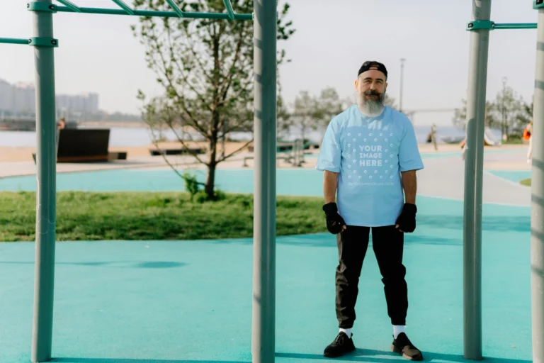 Man Wearing Light Blue T-shirt Mockup Front View Template