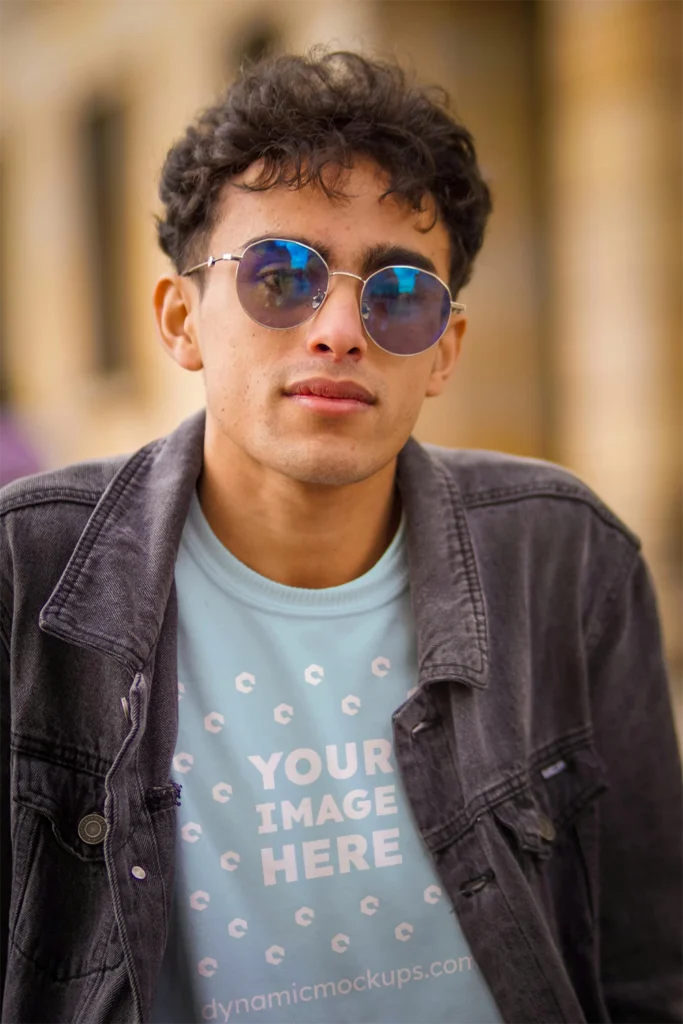 Man Wearing Light Blue T-shirt Mockup Front View Template