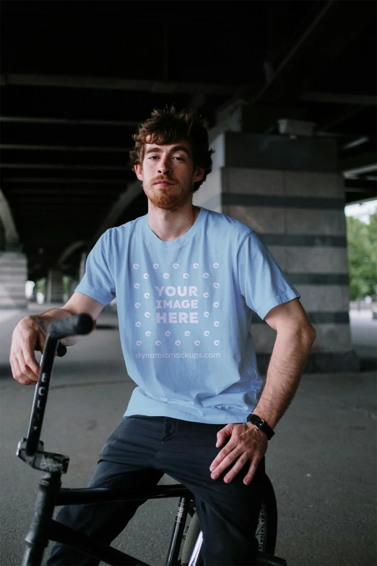 Man Wearing Light Blue T-shirt Mockup Front View Template