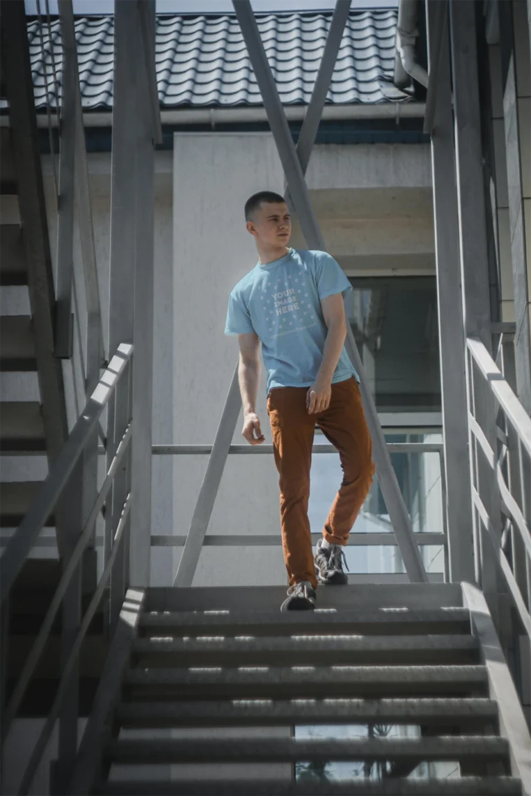 Man Wearing Light Blue T-shirt Mockup Front View Template