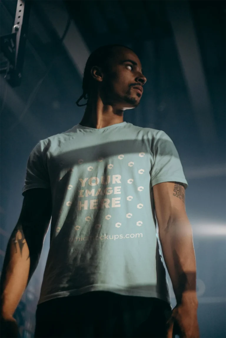 Man Wearing Light Blue T-shirt Mockup Front View Template