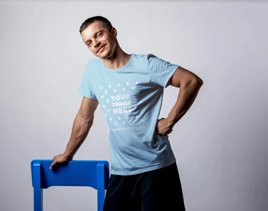 Man Wearing Light Blue T-shirt Mockup Front View Template