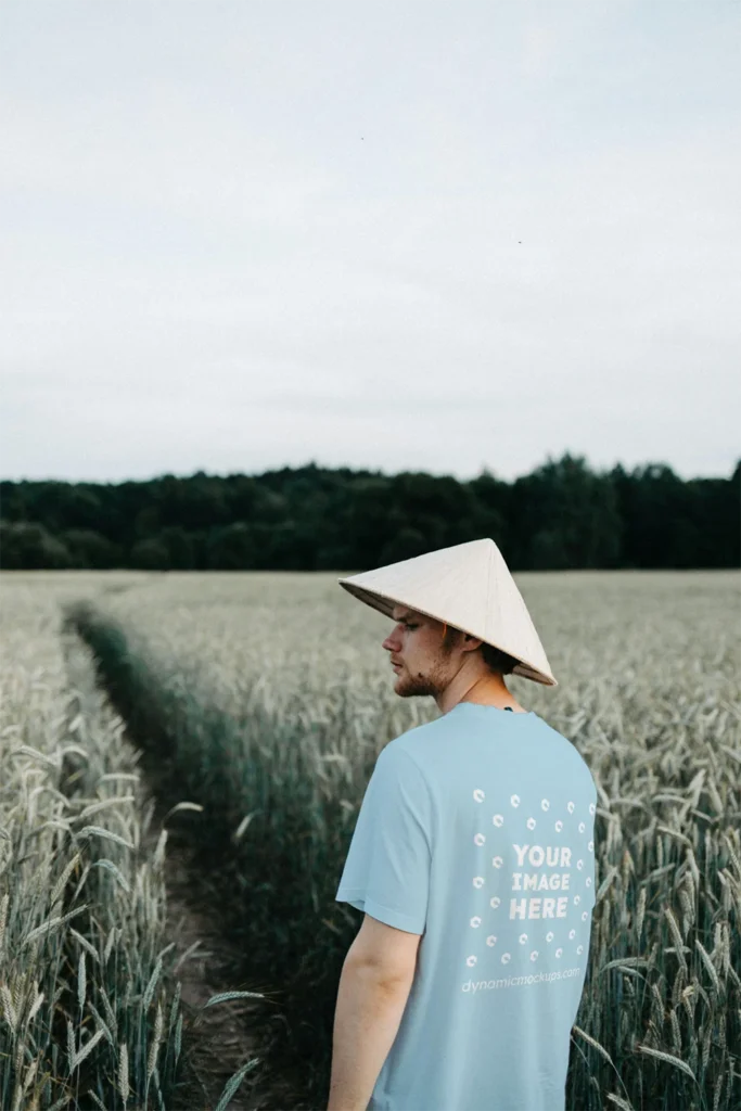 Man Wearing Light Blue T-shirt Mockup Front View Template