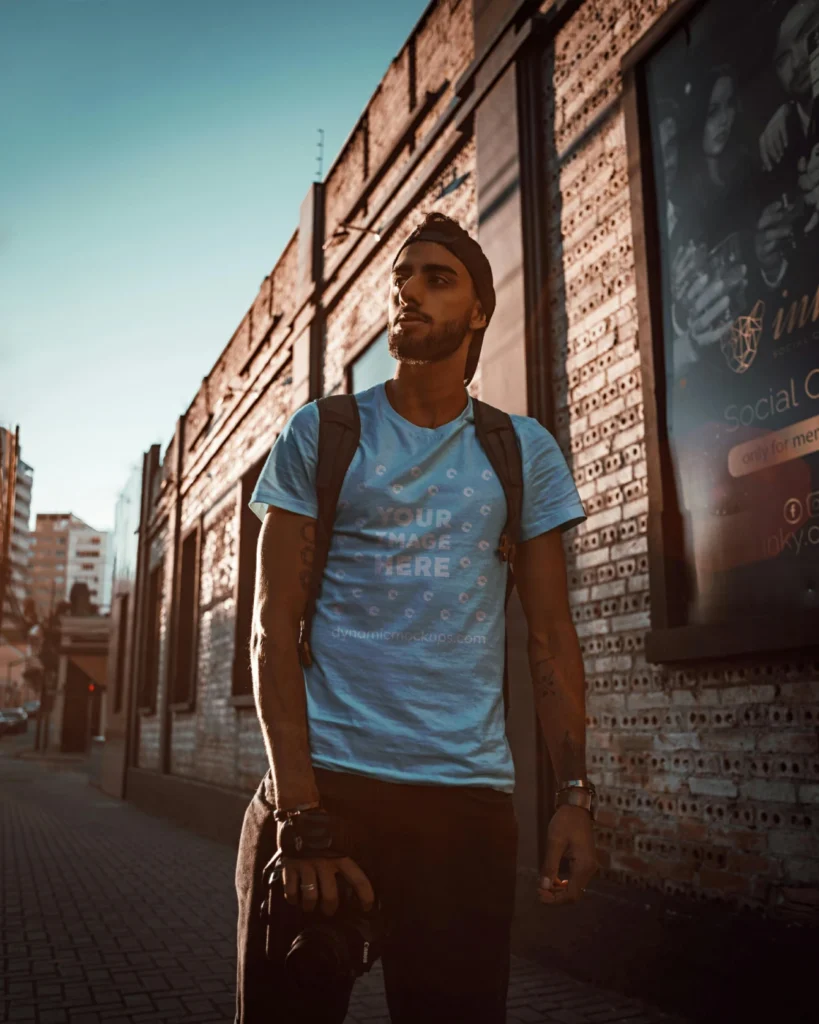 Man Wearing Light Blue T-shirt Mockup Front View Template