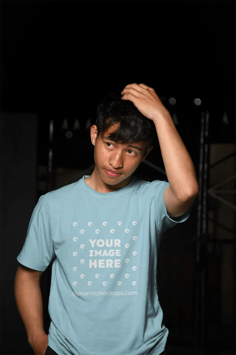 Man Wearing Light Blue T-shirt Mockup Front View Template