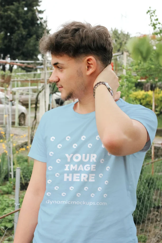 Man Wearing Light Blue T-shirt Mockup Front View Template