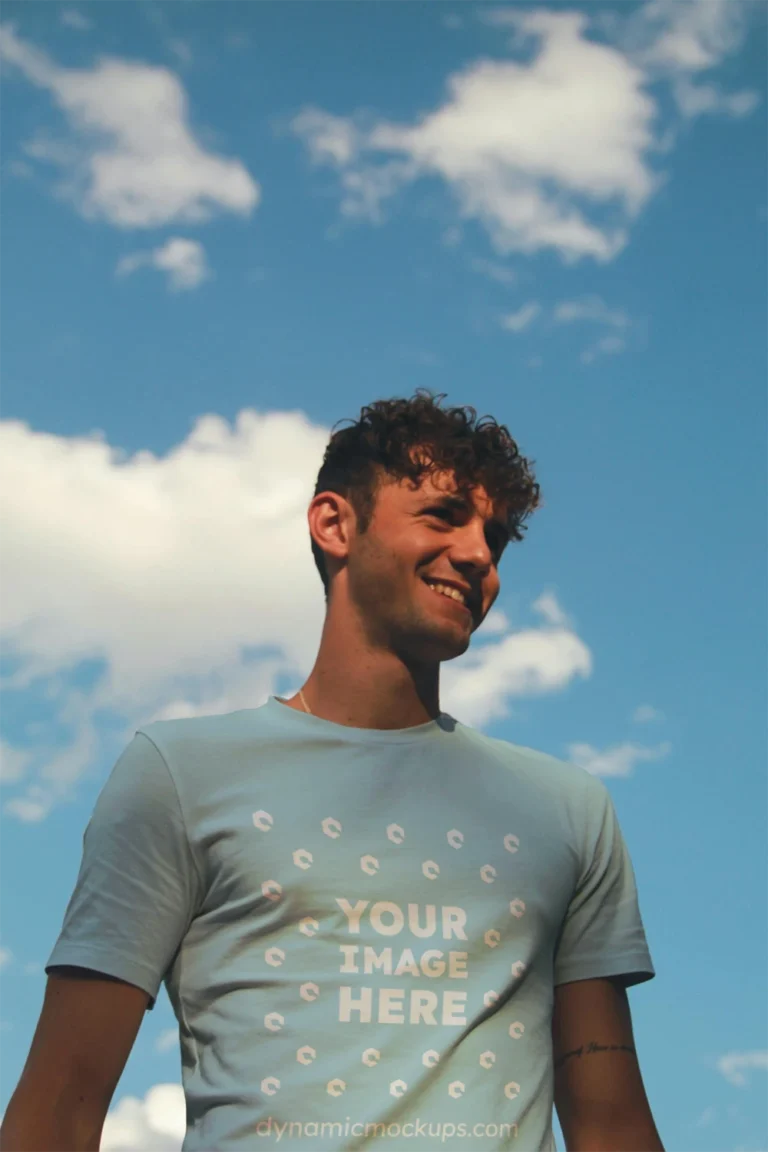 Man Wearing Light Blue T-shirt Mockup Front View Template