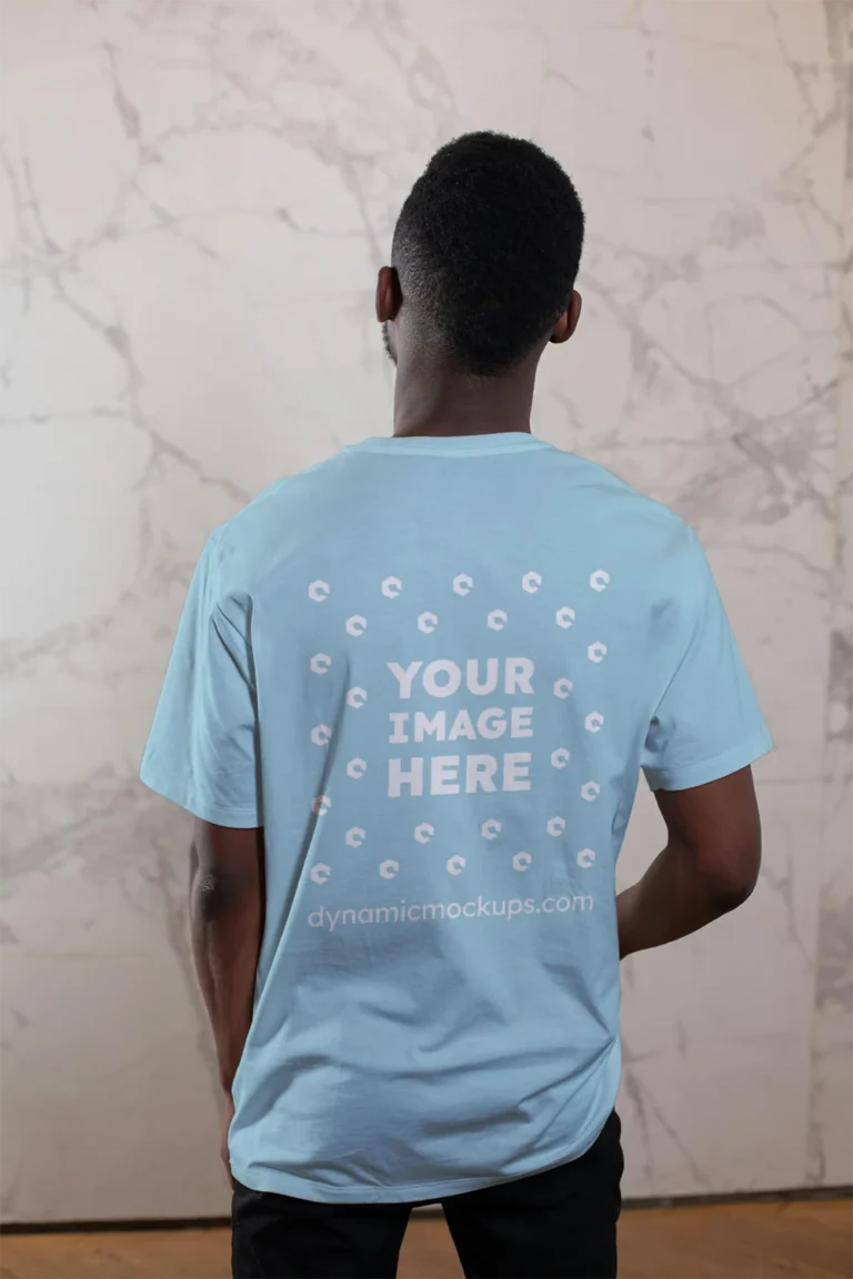 Man Wearing Light Blue T-shirt Mockup Back View Template