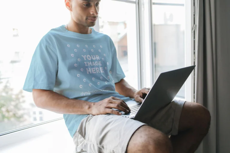 Man Wearing Light Blue T-shirt Mockup Front View Template