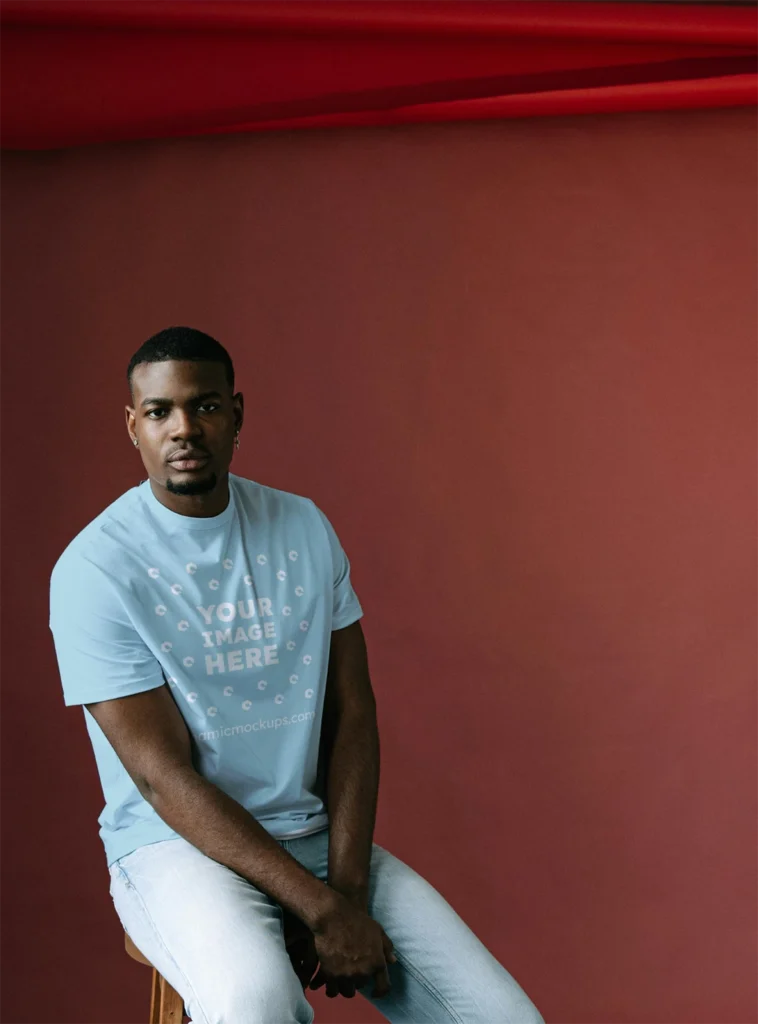 Man Wearing Light Blue T-shirt Mockup Front View Template