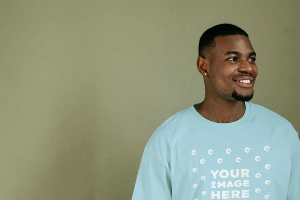 Man Wearing Light Blue T-shirt Mockup Front View Template