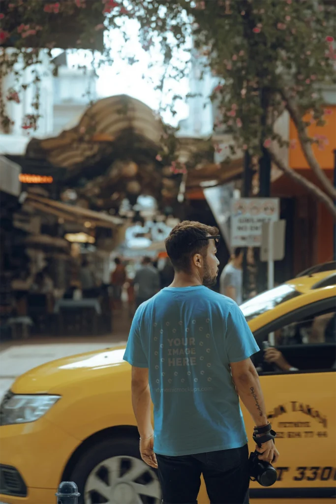 Man Wearing Light Blue T-shirt Mockup Back View Template