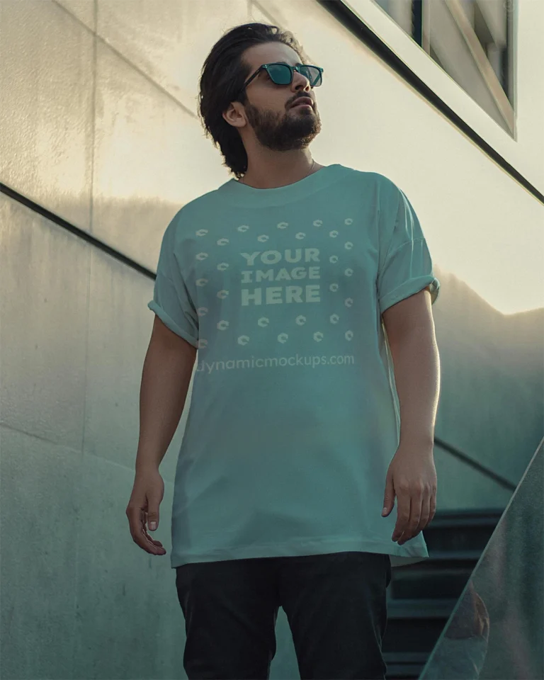 Man Wearing Light Blue T-shirt Mockup Front View Template