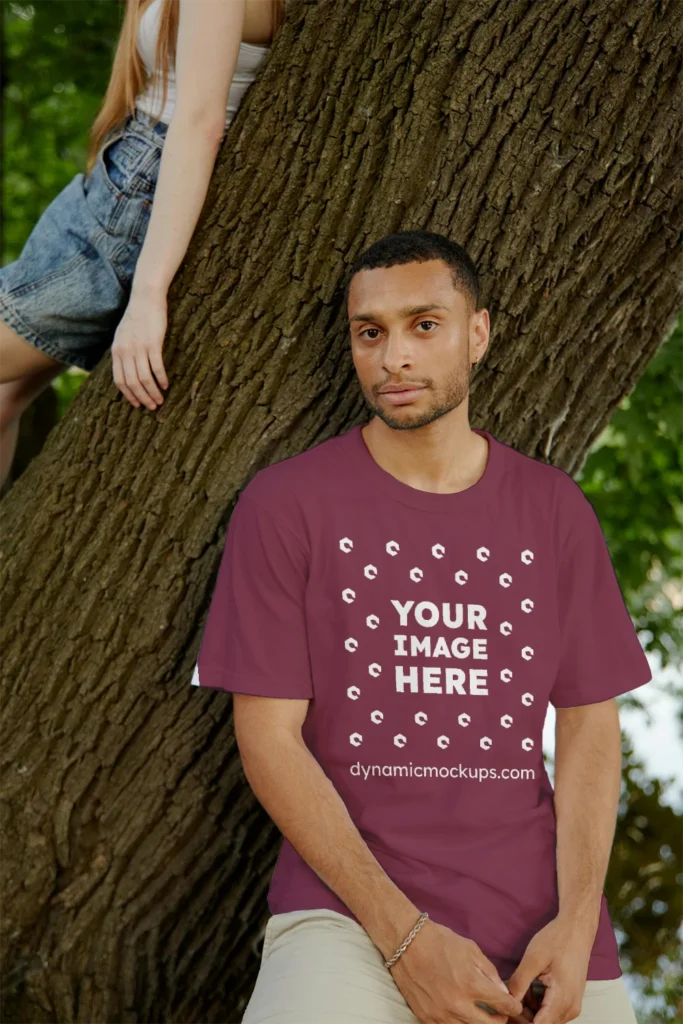 Man Wearing Maroon T-shirt Mockup Front View Template