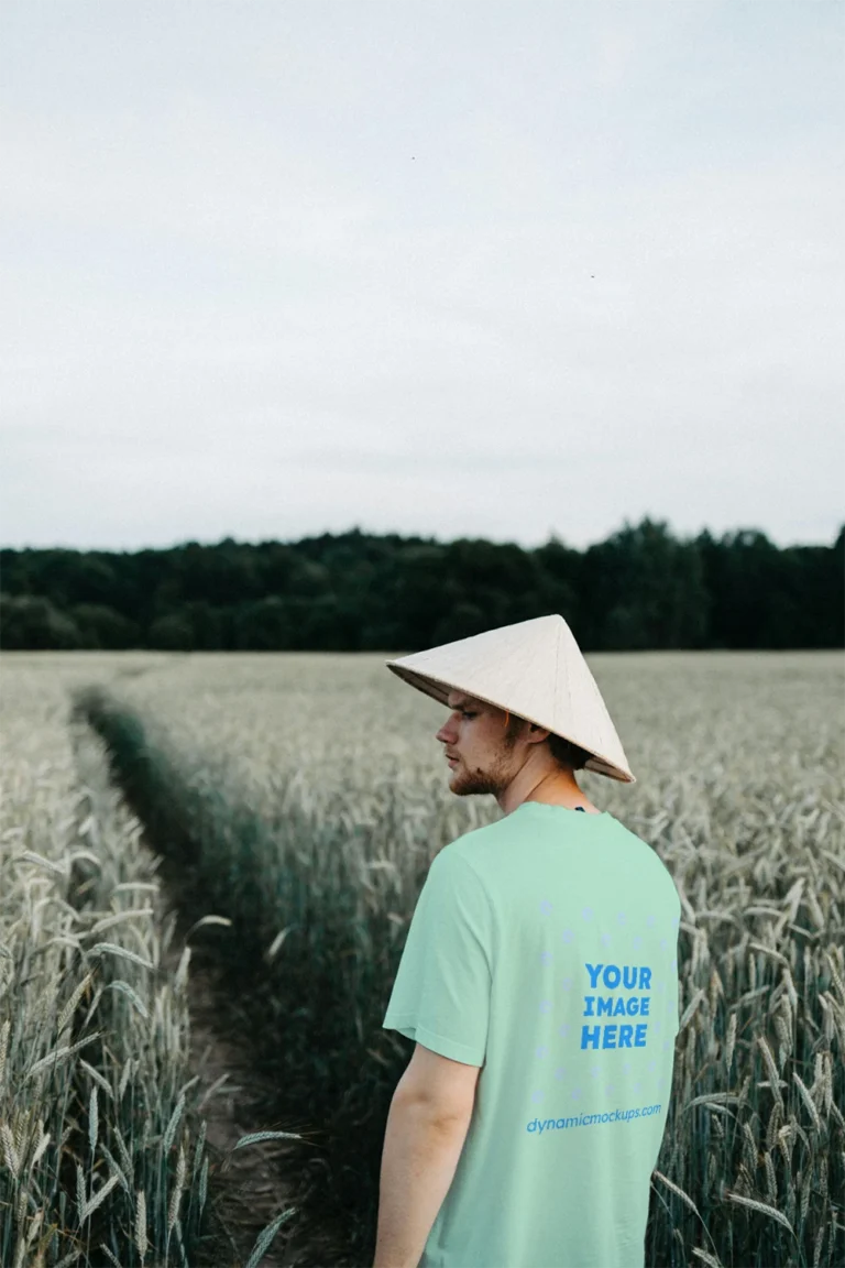 Man Wearing Mint T-shirt Mockup Front View Template