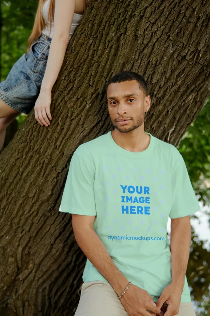 Man Wearing Mint T-shirt Mockup Front View Template