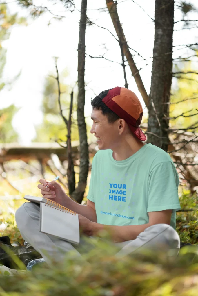 Man Wearing Mint T-shirt Mockup Front View Template