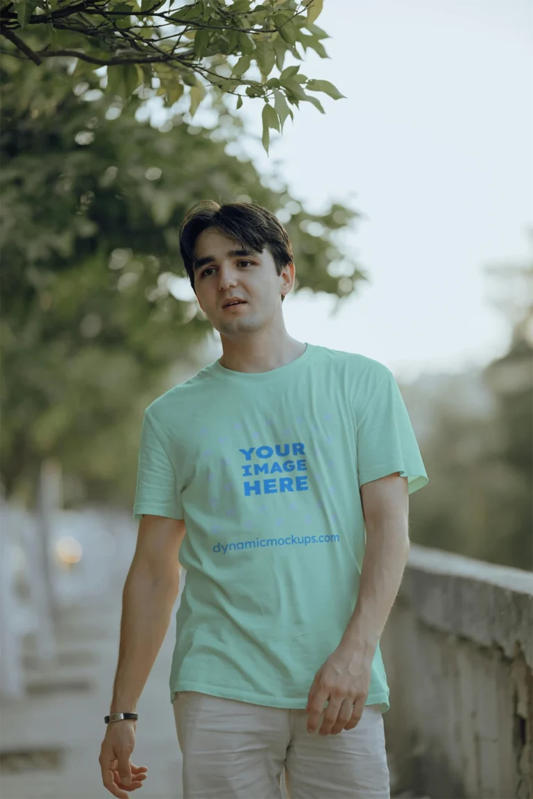 Man Wearing Mint T-shirt Mockup Front View Template