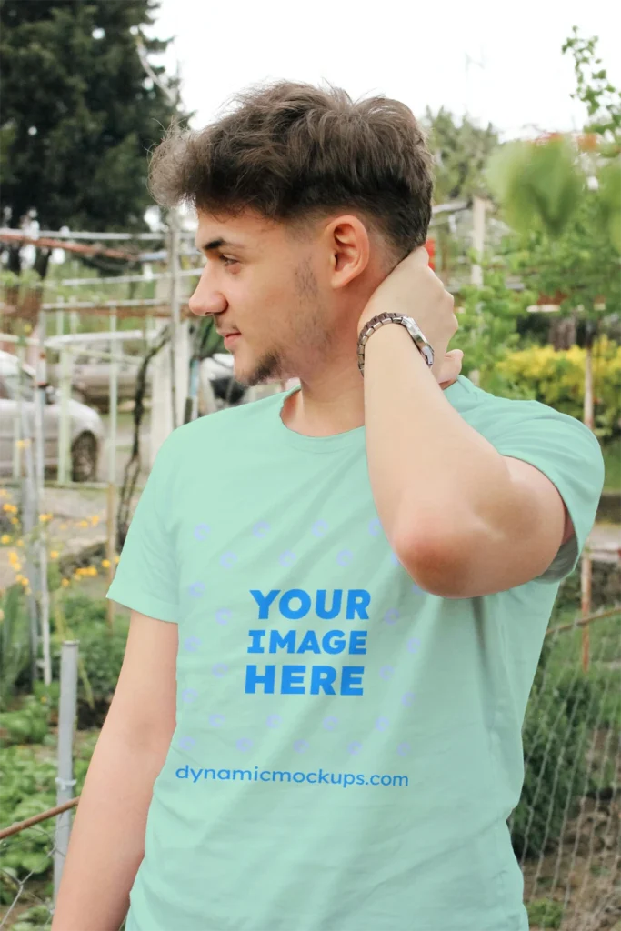 Man Wearing Mint T-shirt Mockup Front View Template