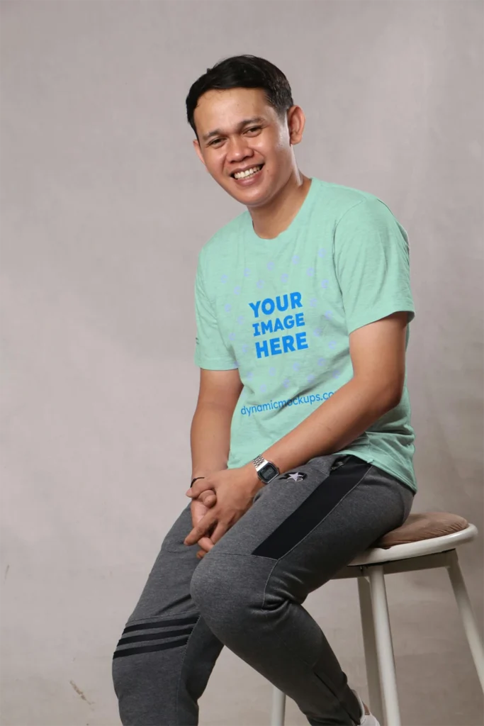 Man Wearing Mint T-shirt Mockup Front View Template