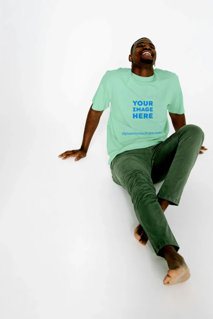 Man Wearing Mint T-shirt Mockup Front View Template