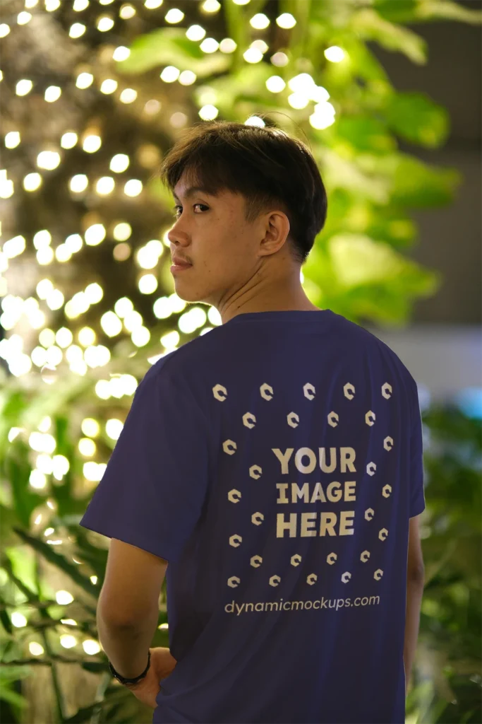 Man Wearing Navy Blue T-shirt Mockup Back View Template