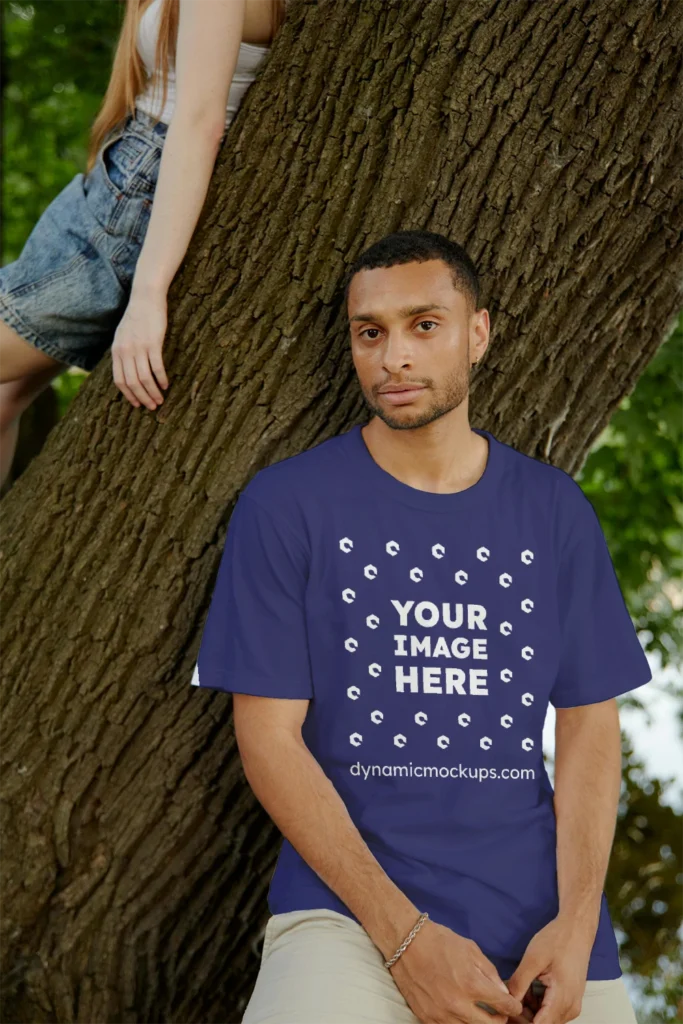 Man Wearing Navy Blue T-shirt Mockup Front View Template