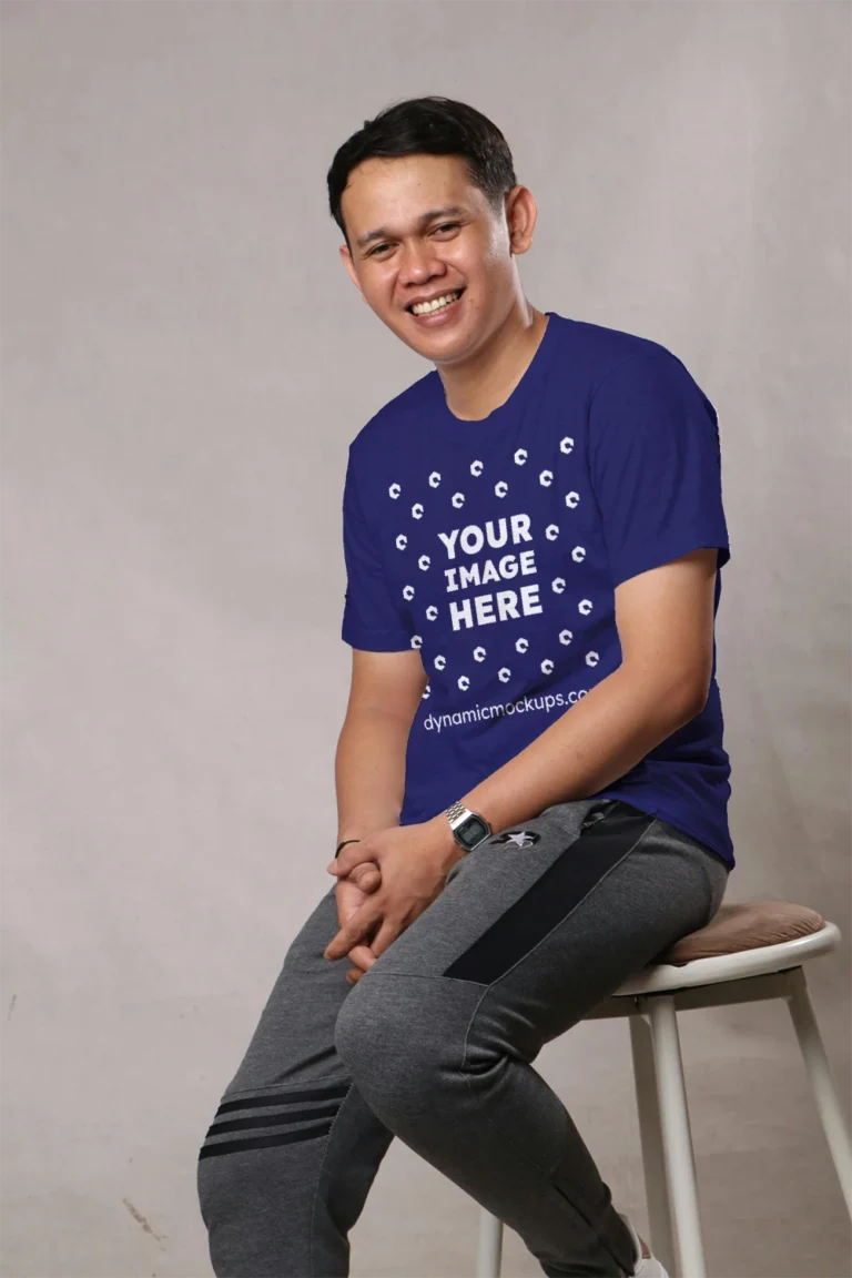 Man Wearing Navy Blue T-shirt Mockup Front View Template