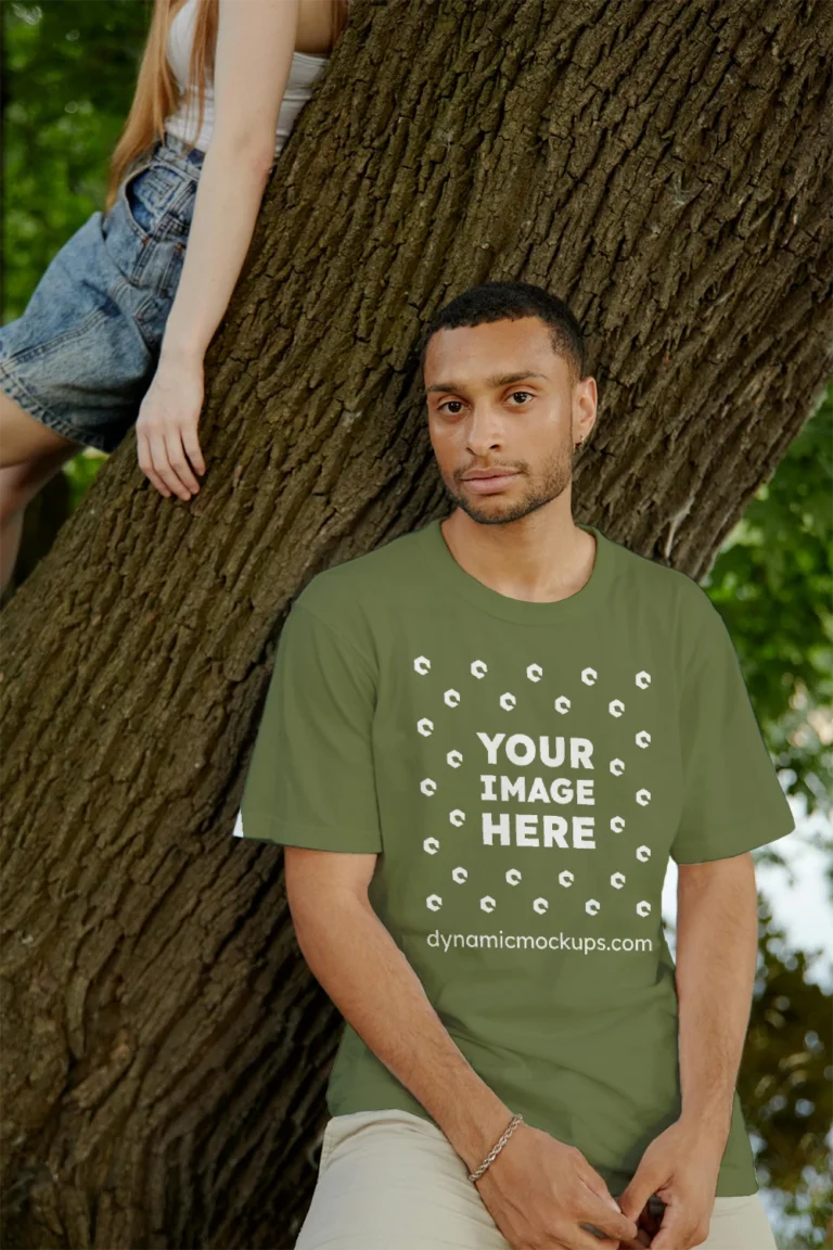 Man Wearing Olive Green T-shirt Mockup Front View Template