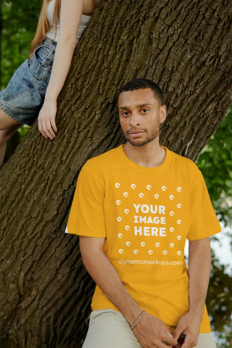 Man Wearing Orange T-shirt Mockup Front View Template