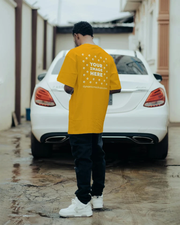 Man Wearing Orange T-shirt Mockup Back View Template