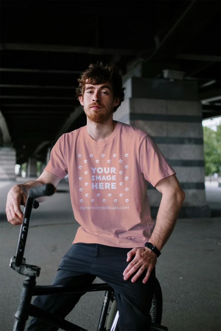 Man Wearing Peach T-shirt Mockup Front View Template