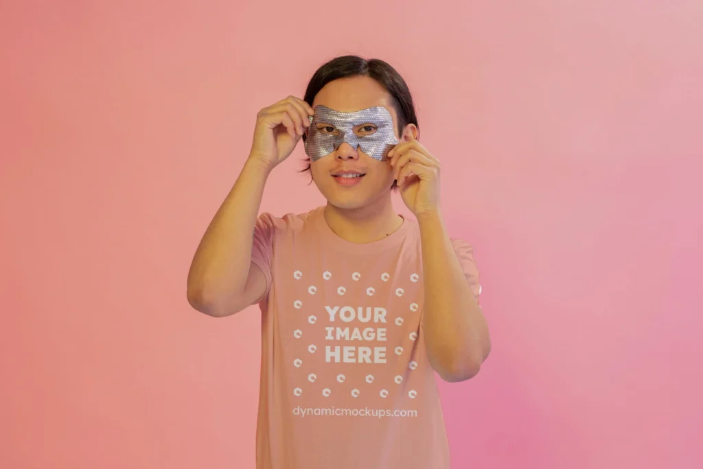 Man Wearing Peach T-shirt Mockup Front View Template