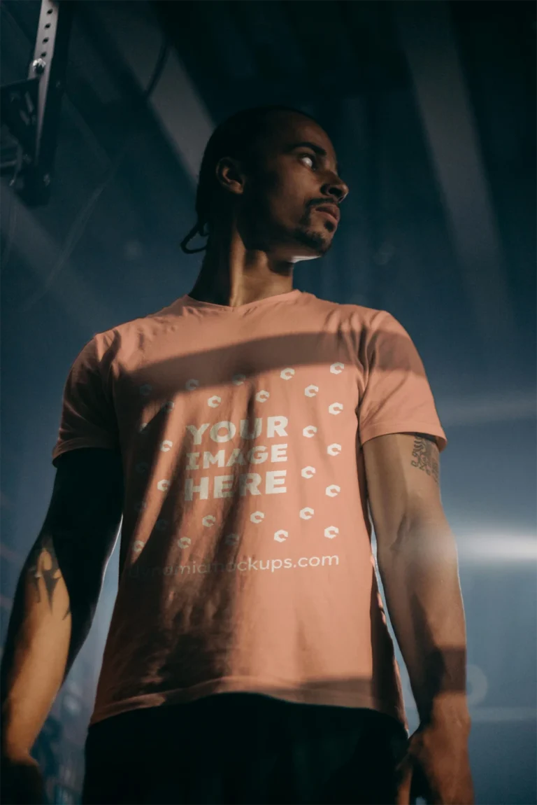 Man Wearing Peach T-shirt Mockup Front View Template