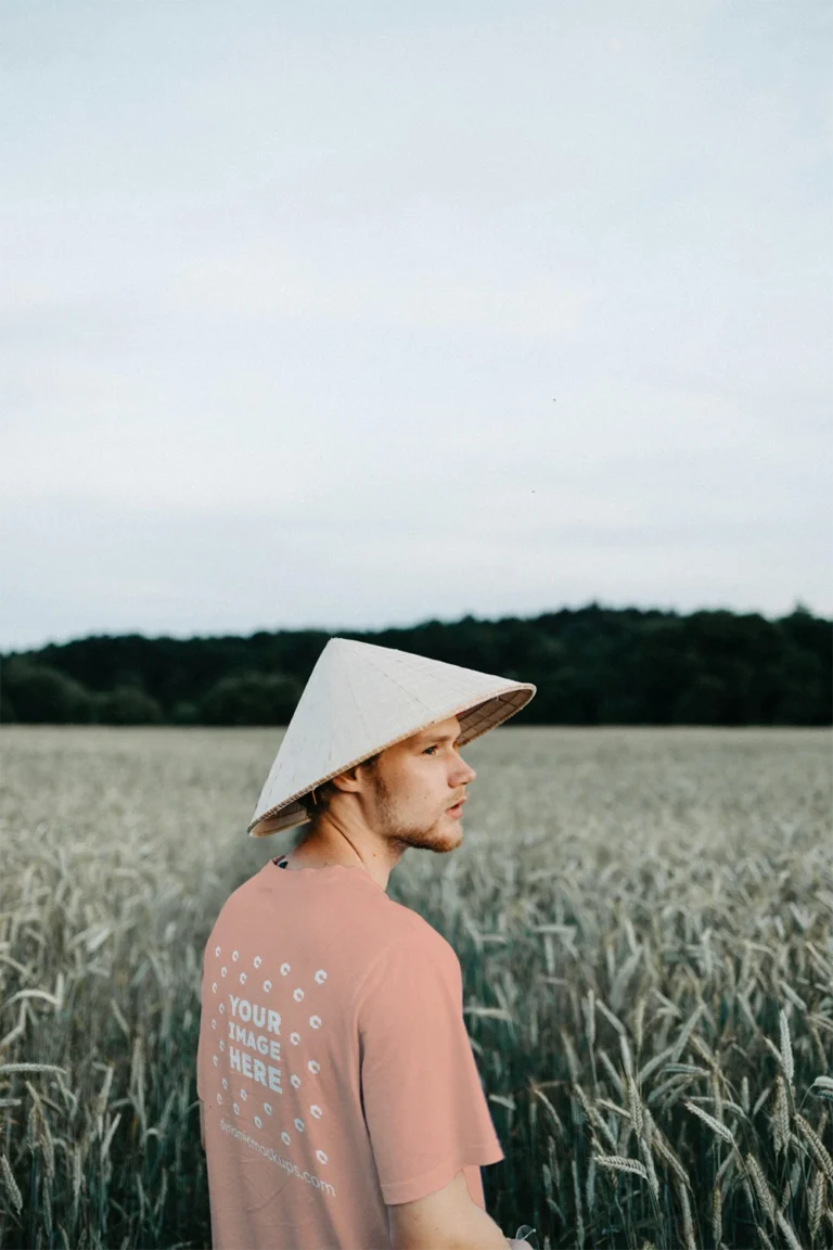 Man Wearing Peach T-shirt Mockup Front View Template