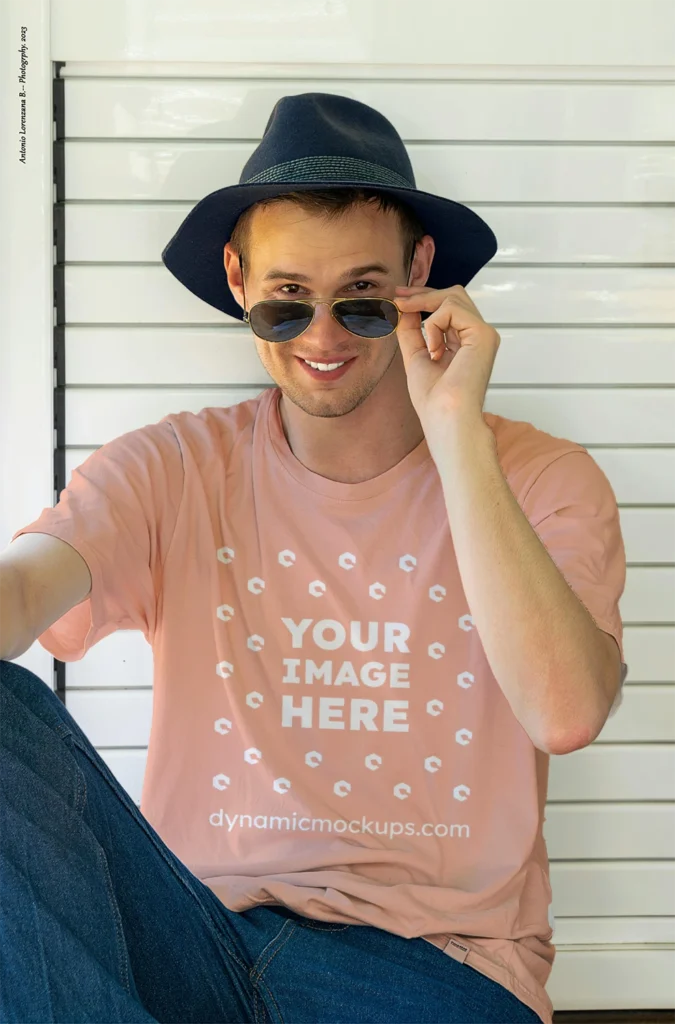 Man Wearing Peach T-shirt Mockup Front View Template