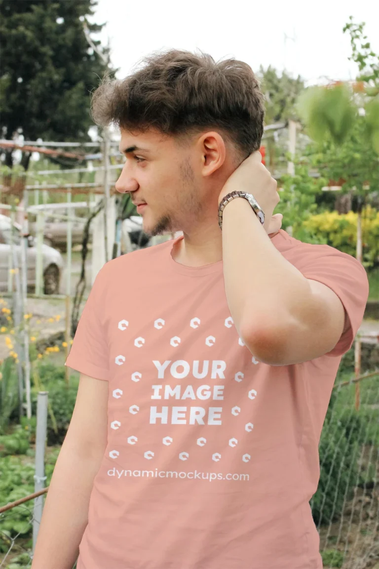 Man Wearing Peach T-shirt Mockup Front View Template