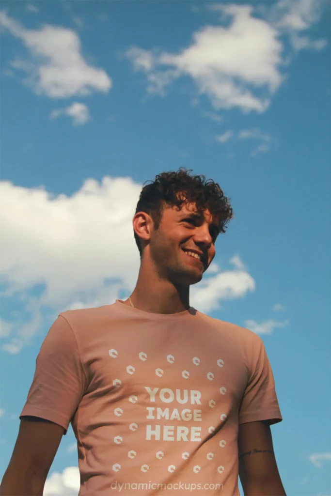 Man Wearing Peach T-shirt Mockup Front View Template