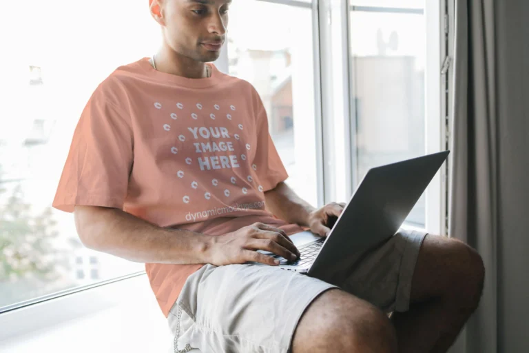 Man Wearing Peach T-shirt Mockup Front View Template