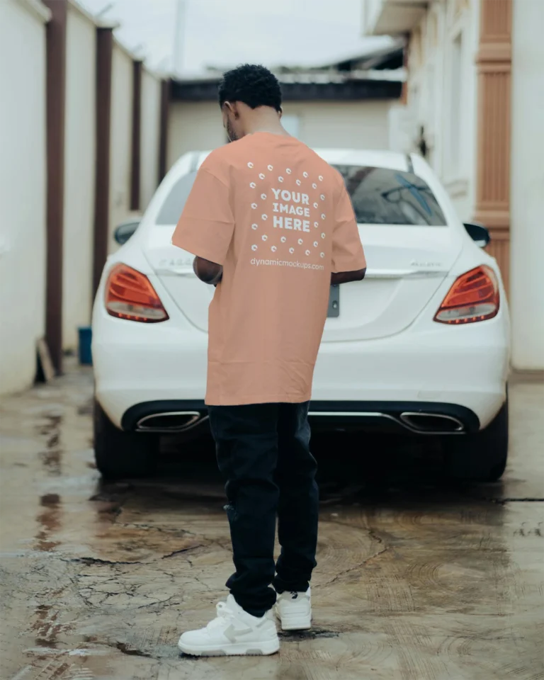 Man Wearing Peach T-shirt Mockup Back View Template