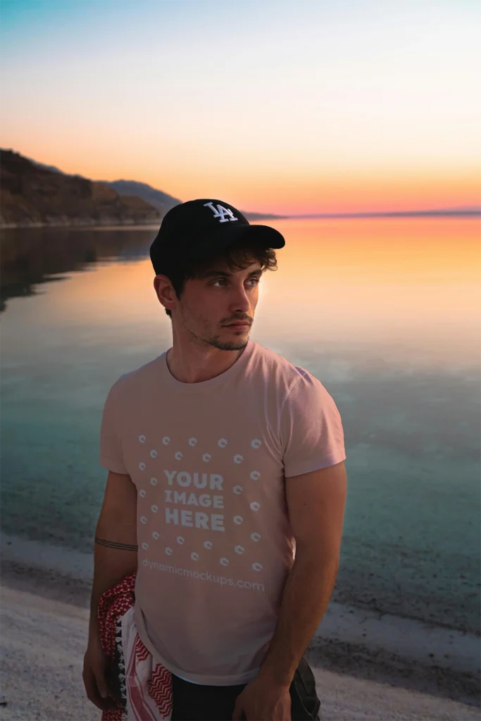 Man Wearing Peach T-shirt Mockup Front View Template