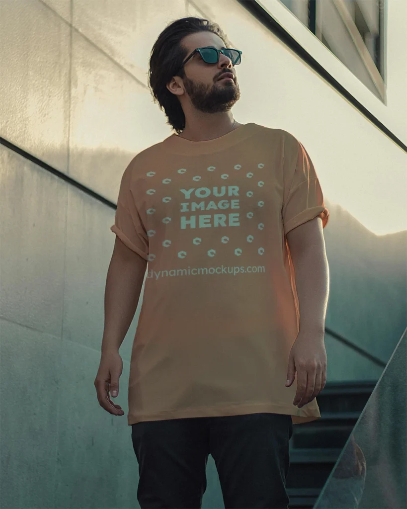 Man Wearing Peach T-shirt Mockup Front View Template