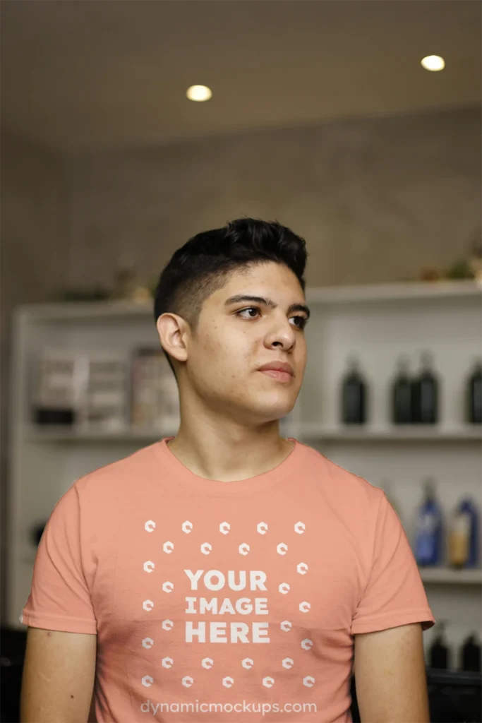 Man Wearing Peach T-shirt Mockup Front View Template