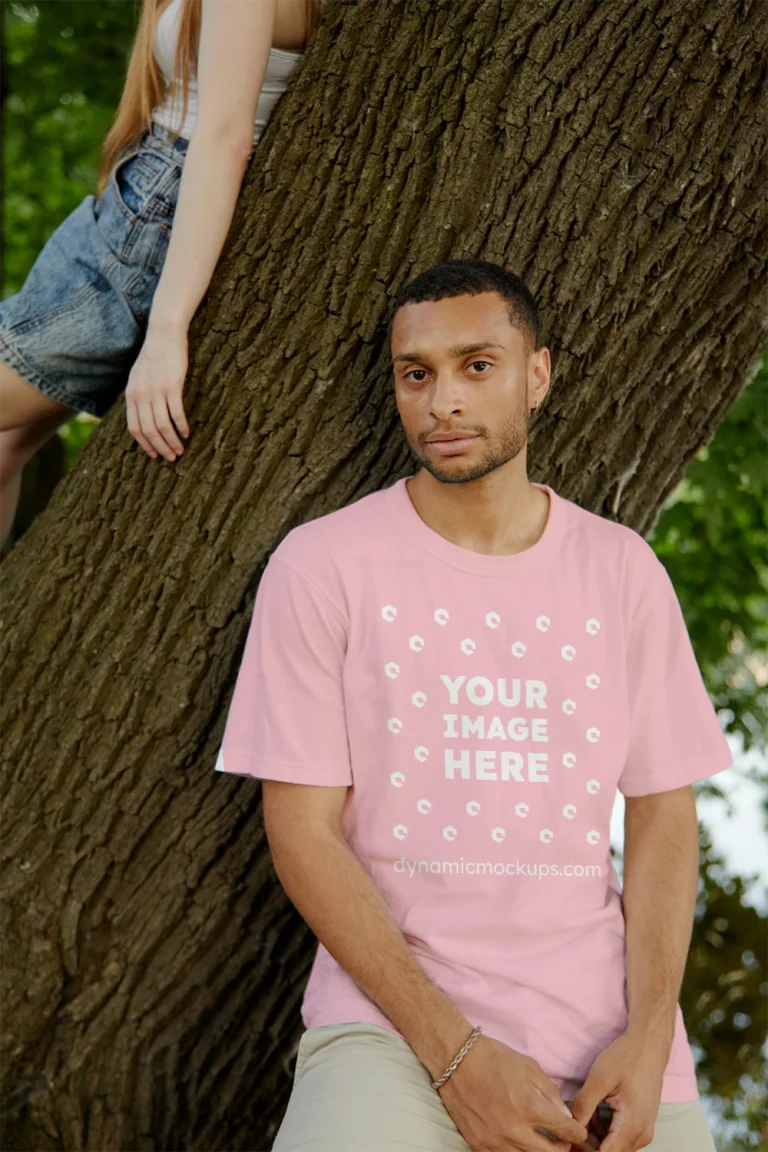 Man Wearing Pink T-shirt Mockup Front View Template