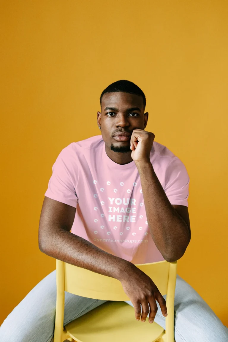 Man Wearing Pink T-shirt Mockup Front View Template